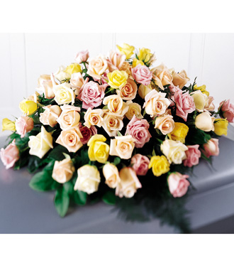 The FTD Peaceful Tribute Casket Spray